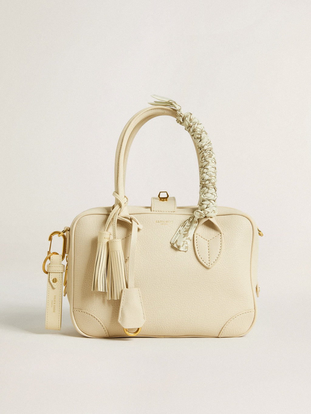 Worn white keyring
