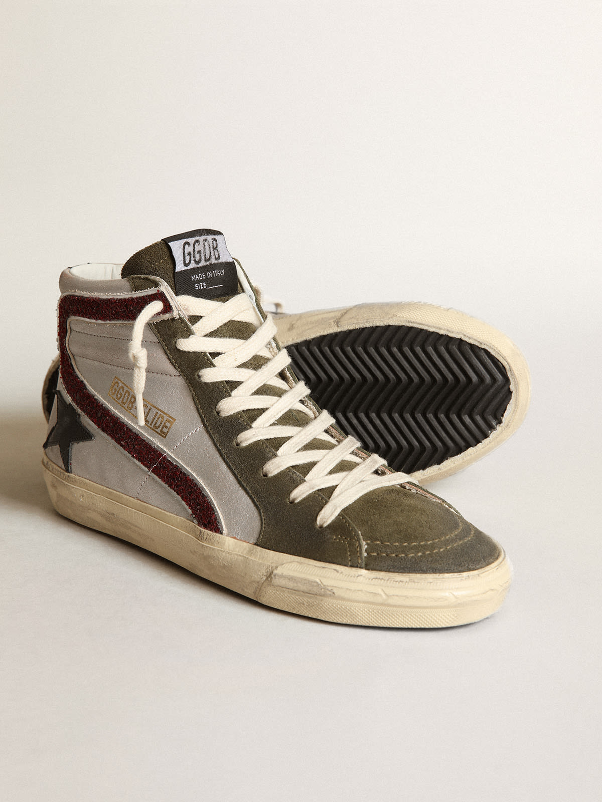 Slide in argento con stella in pelle nera e virgola in glitter