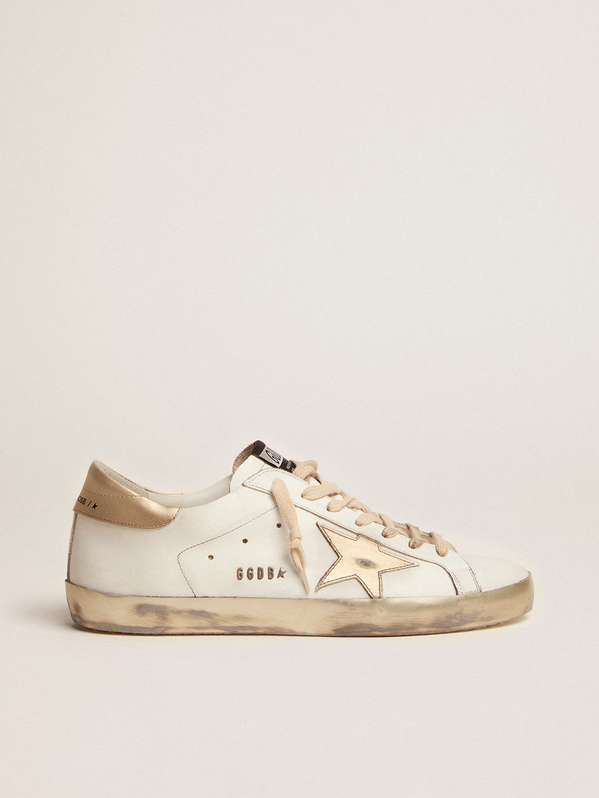 Sneakers Super-Star uomo con foxing sparkle dorato e metal studs lettering