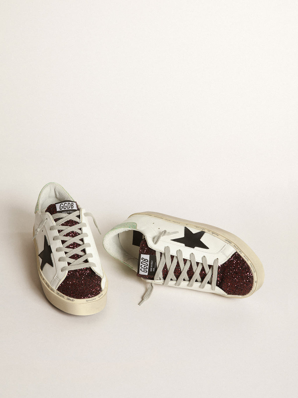 Sneakers Hi-Star bianche con inserto in glitter e stella nera