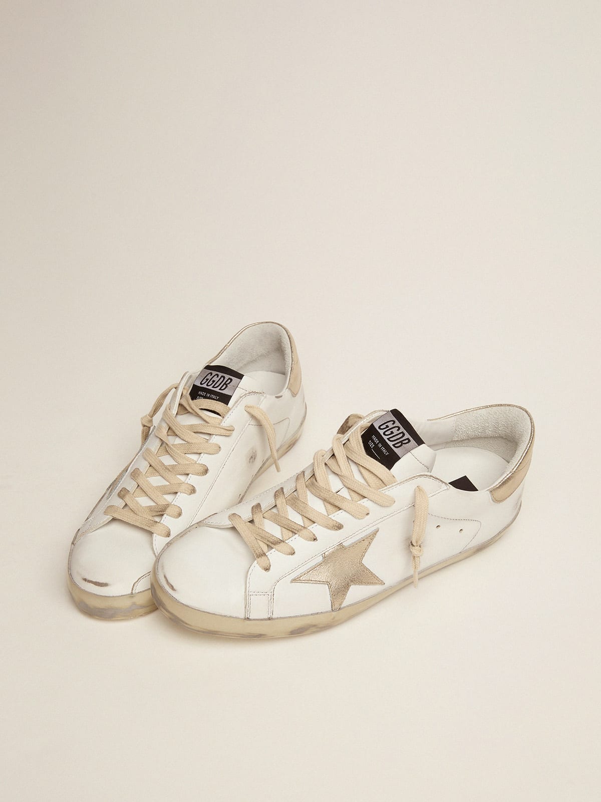 Sneakers Super-Star uomo con foxing sparkle dorato e metal studs lettering