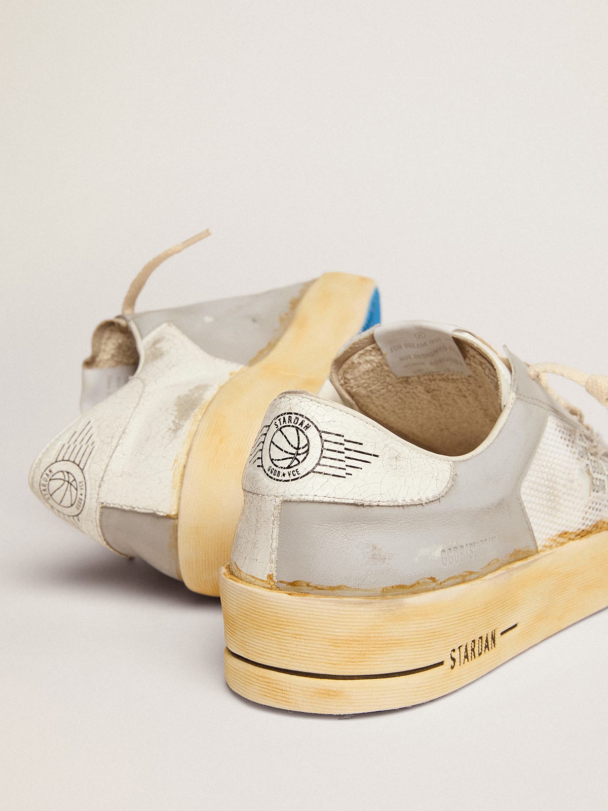 Sneaker Stardan con stella in pelle bianca con stampa GGDB e talloncino in pelle bianca cracklé