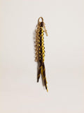 Charm with yellow and brown knotted hiking laces with chain