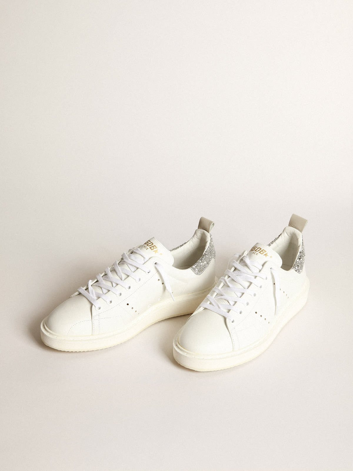 Sneaker Starter in pelle bianca con talloncino in glitter argento