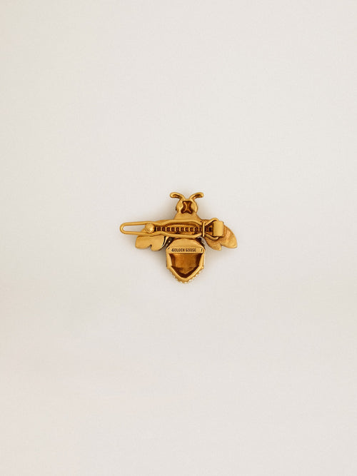 Bee-shaped lace tag in antique gold color with crystals