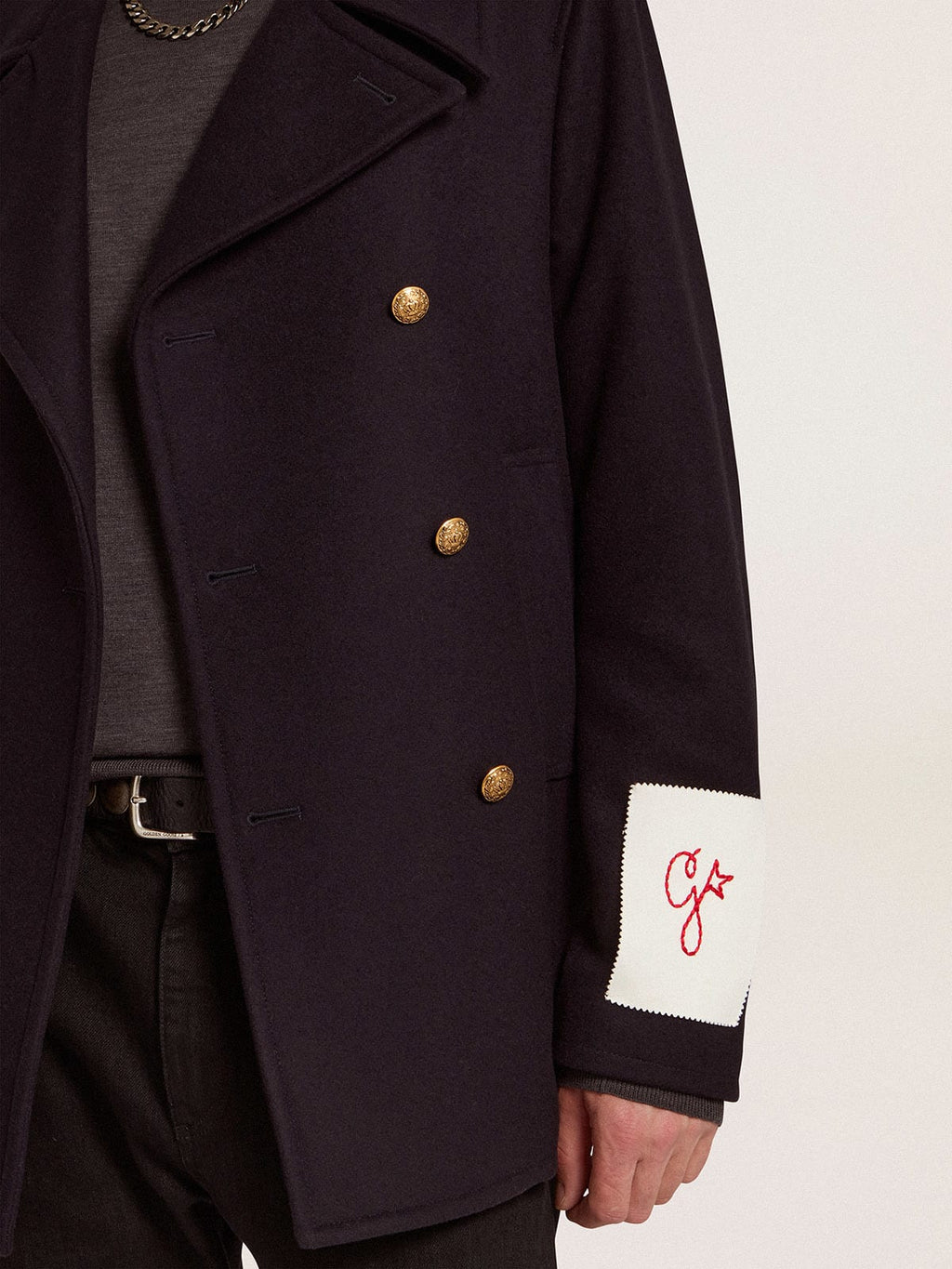 Peacoat da uomo blu scuro con bottoni araldici dorati