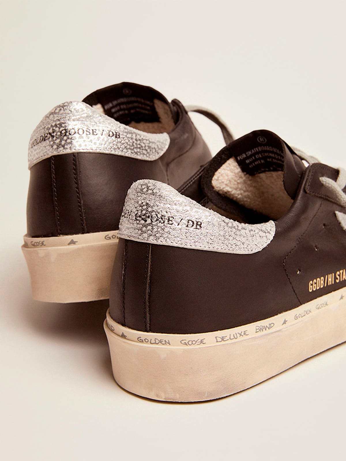 Sneaker Hi Star in pelle nera con stella in pelle laminata color argento