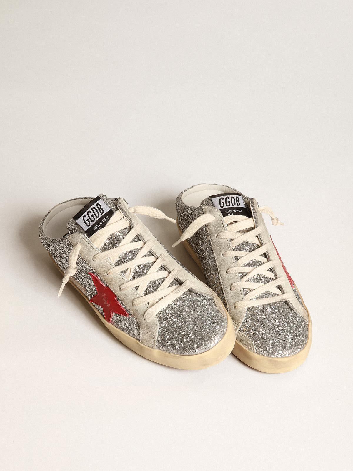 Super-Star Sabot in glitter argento con stella in pelle rossa