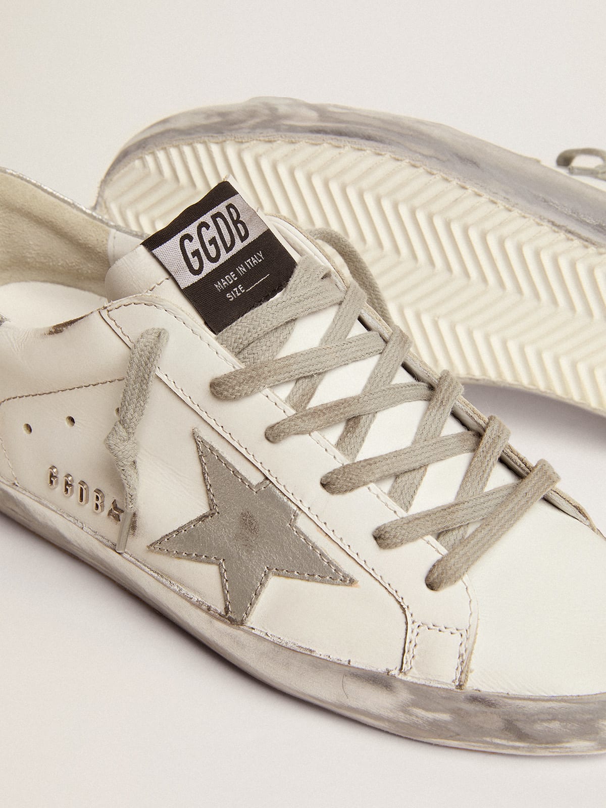 Sneakers Super-Star con foxing sparkle argento e metal studs lettering
