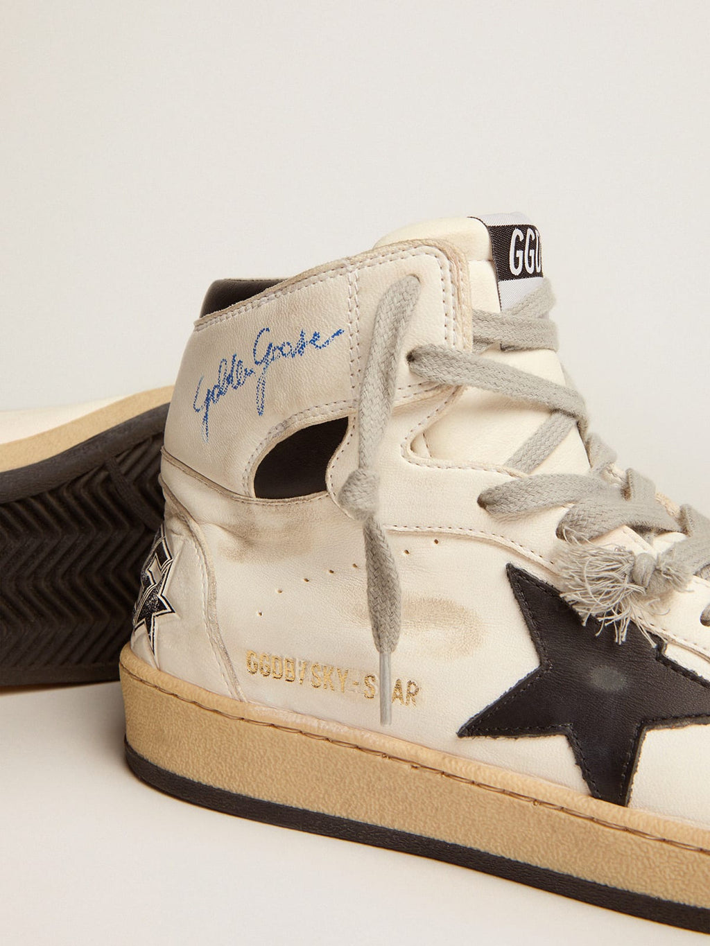 Sneaker Sky-Star donna con firma sulla caviglia e inserti in pelle nera