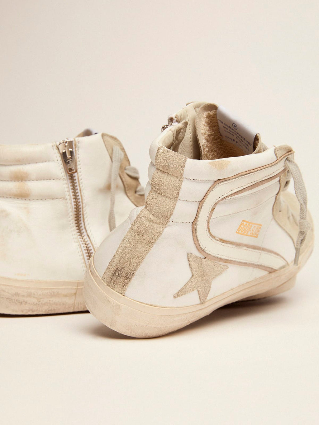Sneakers Slide in pelle con stella e dettagli in camoscio