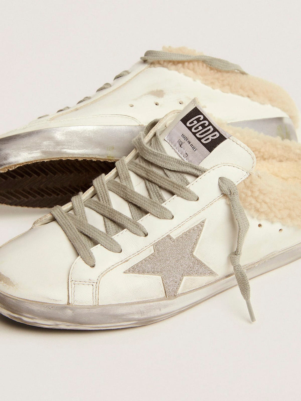 Super-Star Sabot in pelle bianca e fodera in shearling