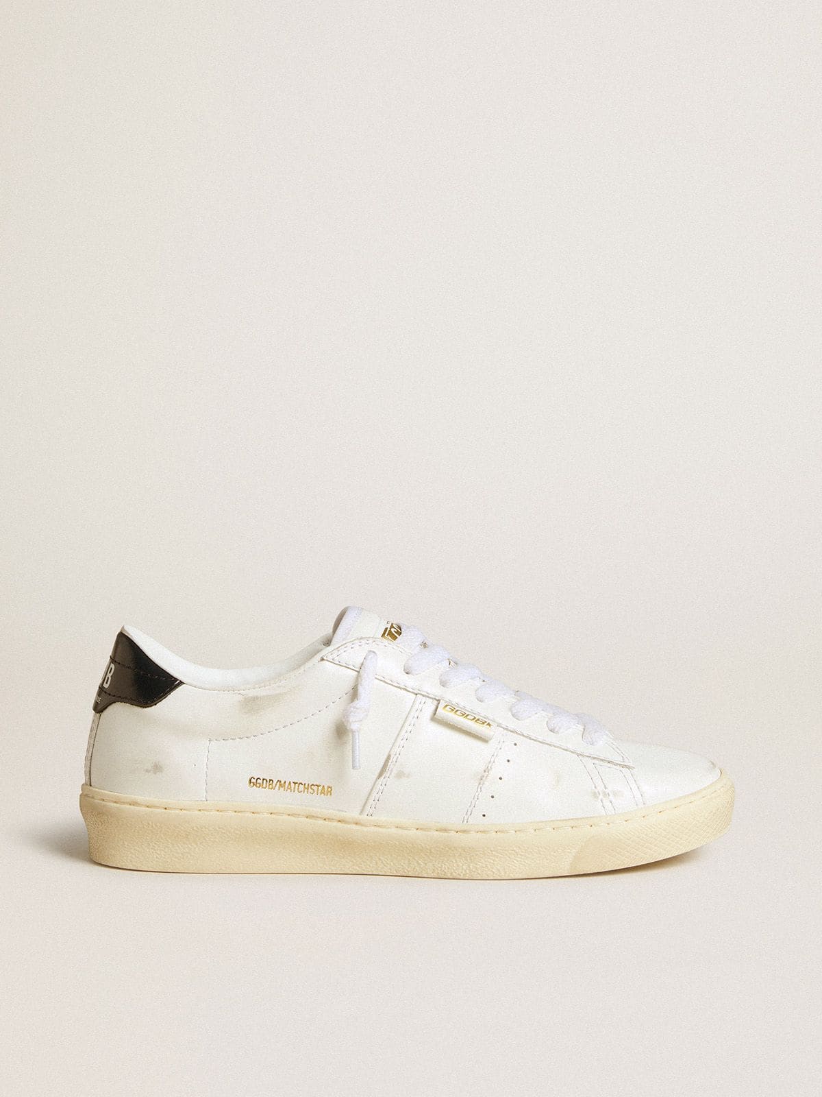 Women's Matchstar in white leather with dark blue leather heel tab