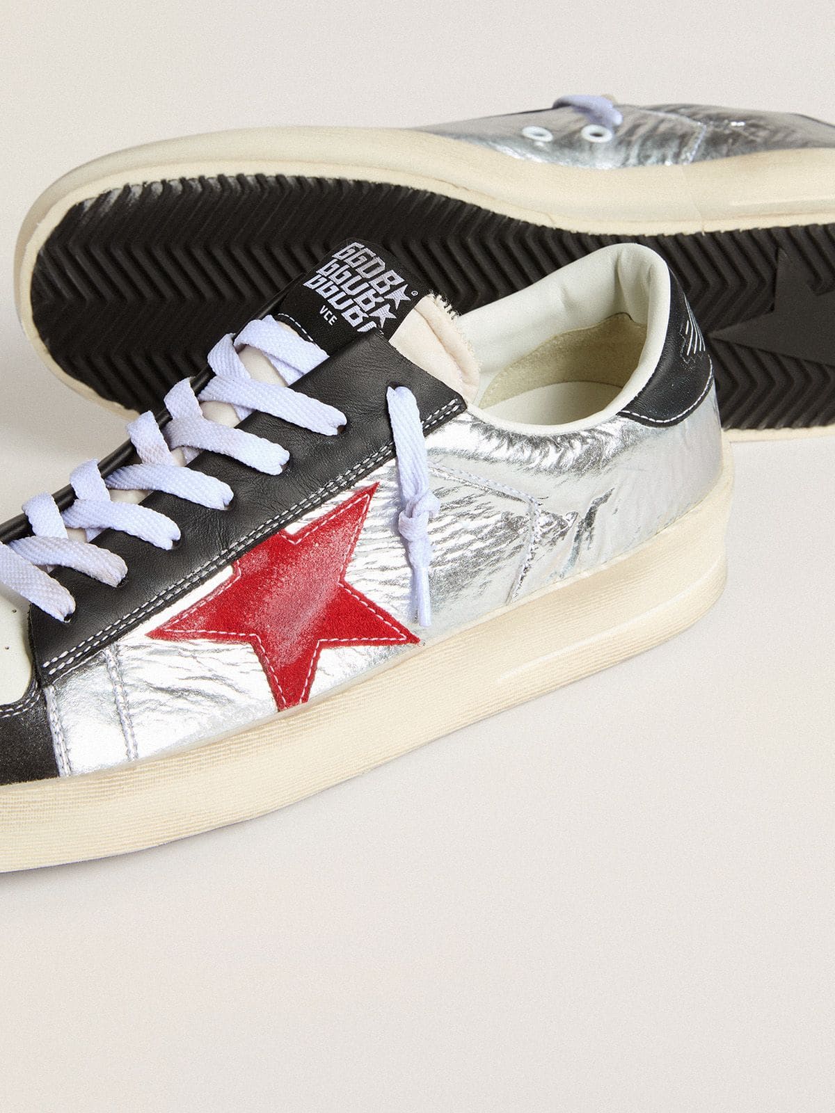 Men’s Stardan in laminated silver nylon with burgundy suede star