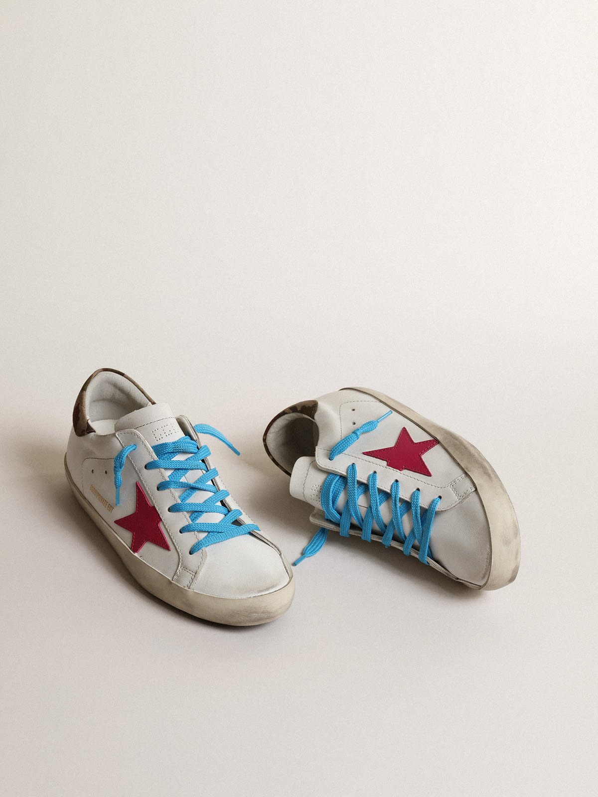 Super-Star LTD con stella in suede fucsia e talloncino camouflage
