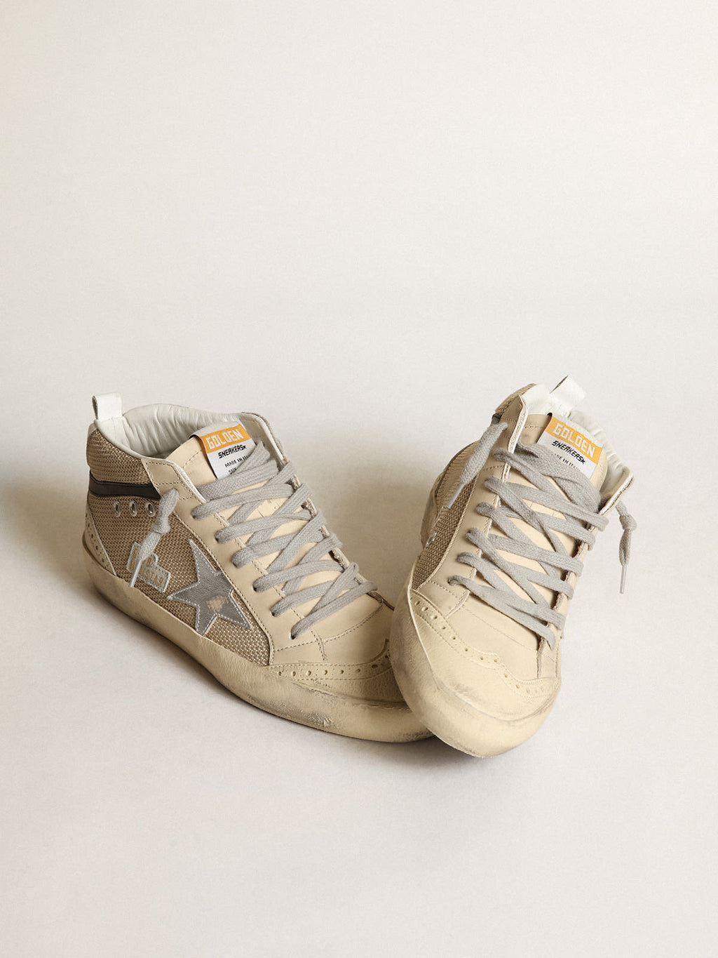Sneaker Mid Star LTD in rete color crema con stella in pelle laminata color argento e virgola in pelle nera