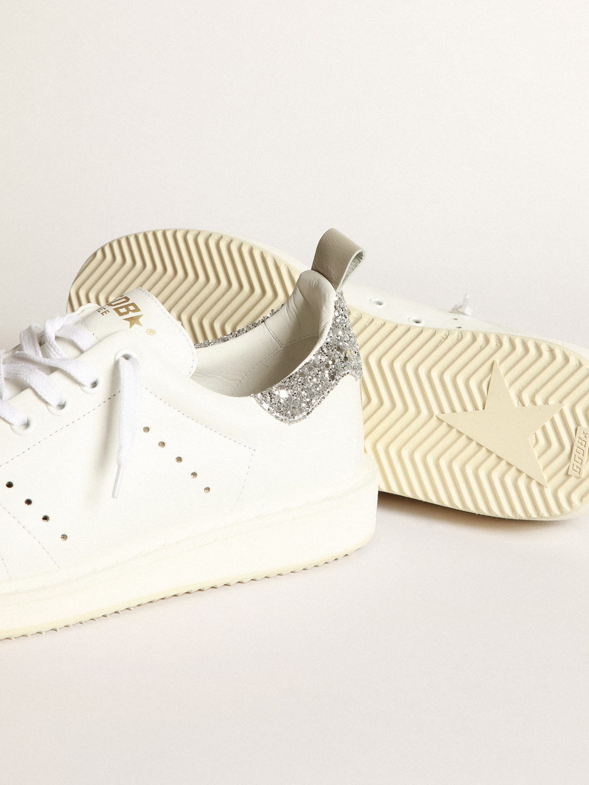 Sneaker Starter in pelle bianca con talloncino in glitter argento