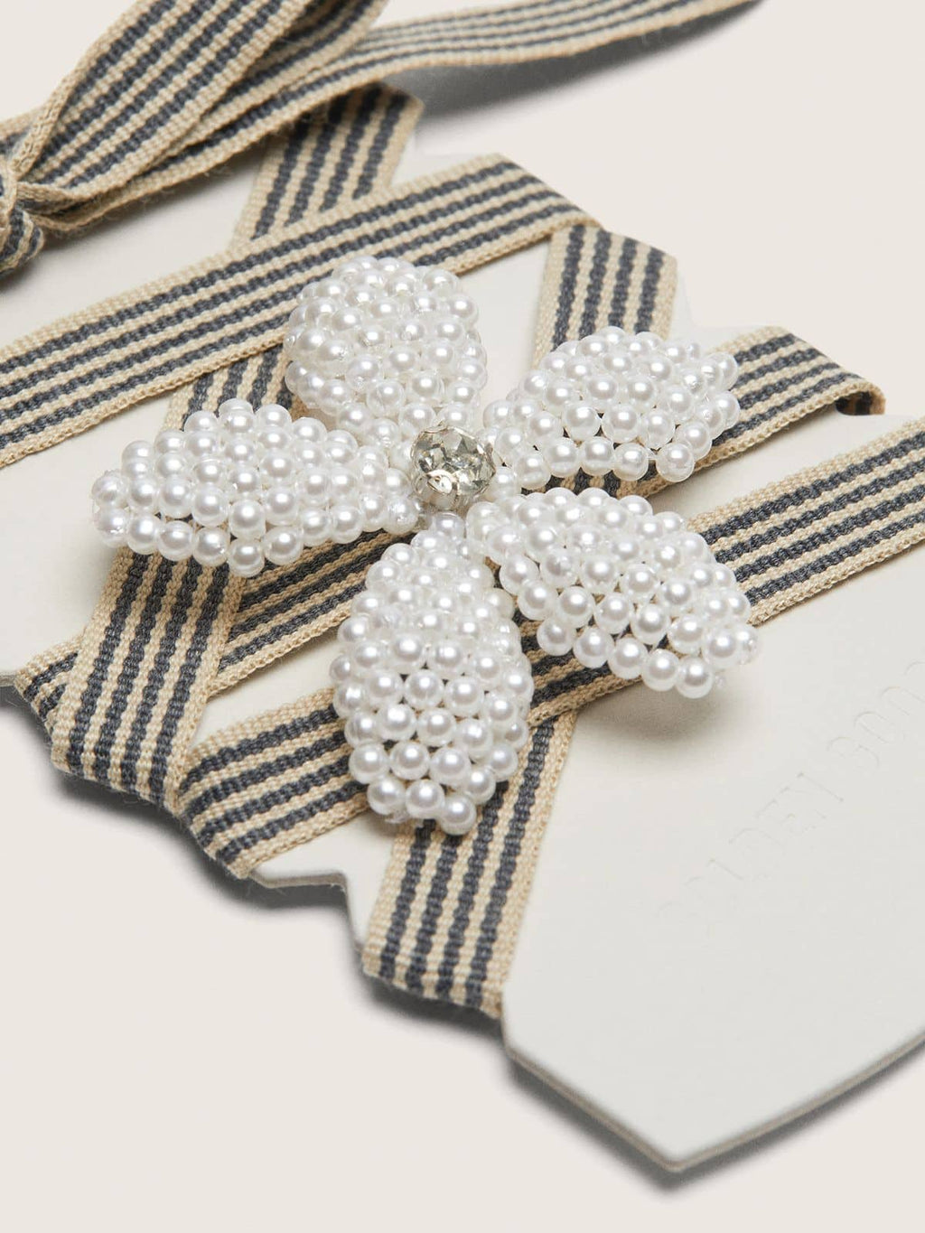 Skins "Vintage" black and beige striped laces with flower-shaped charm
