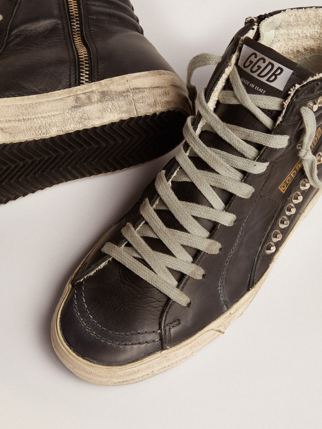 Sneakers Slide donna con borchie applicate