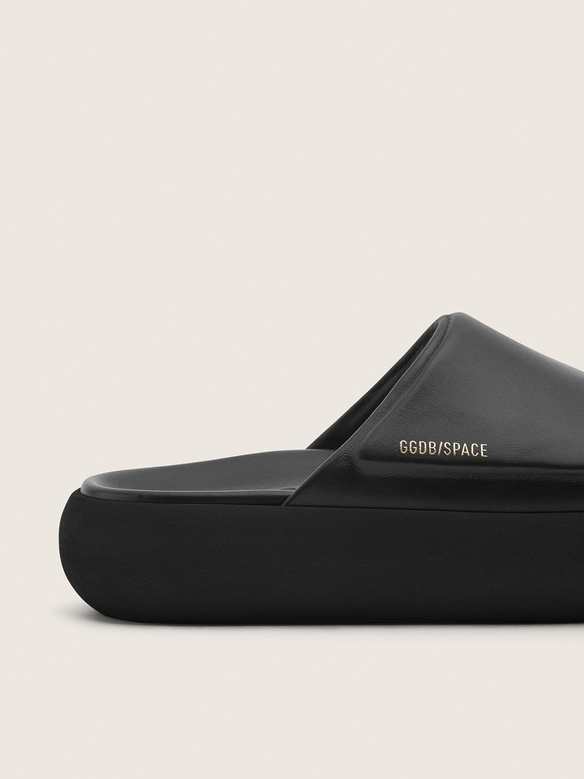 Men's Space-Star Slide slip-ons in black leather