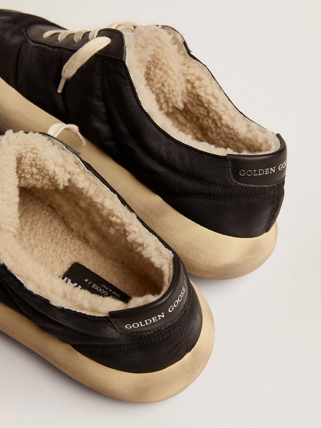 Space-Star Uomo in nylon nero trapuntato e fodera in shearling