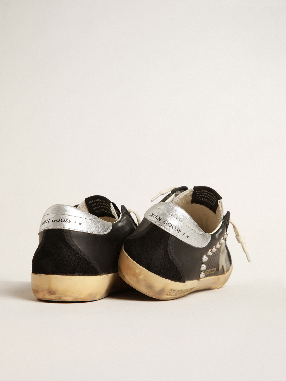 Super-Star Donna in pelle e suede neri con borchie color argento
