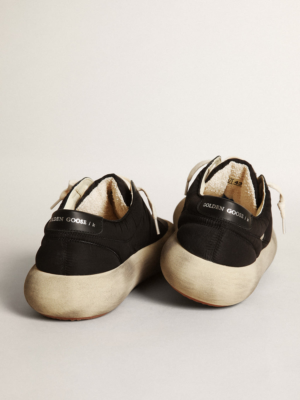 Space-Star Uomo in nylon con stella e talloncino in pelle nera