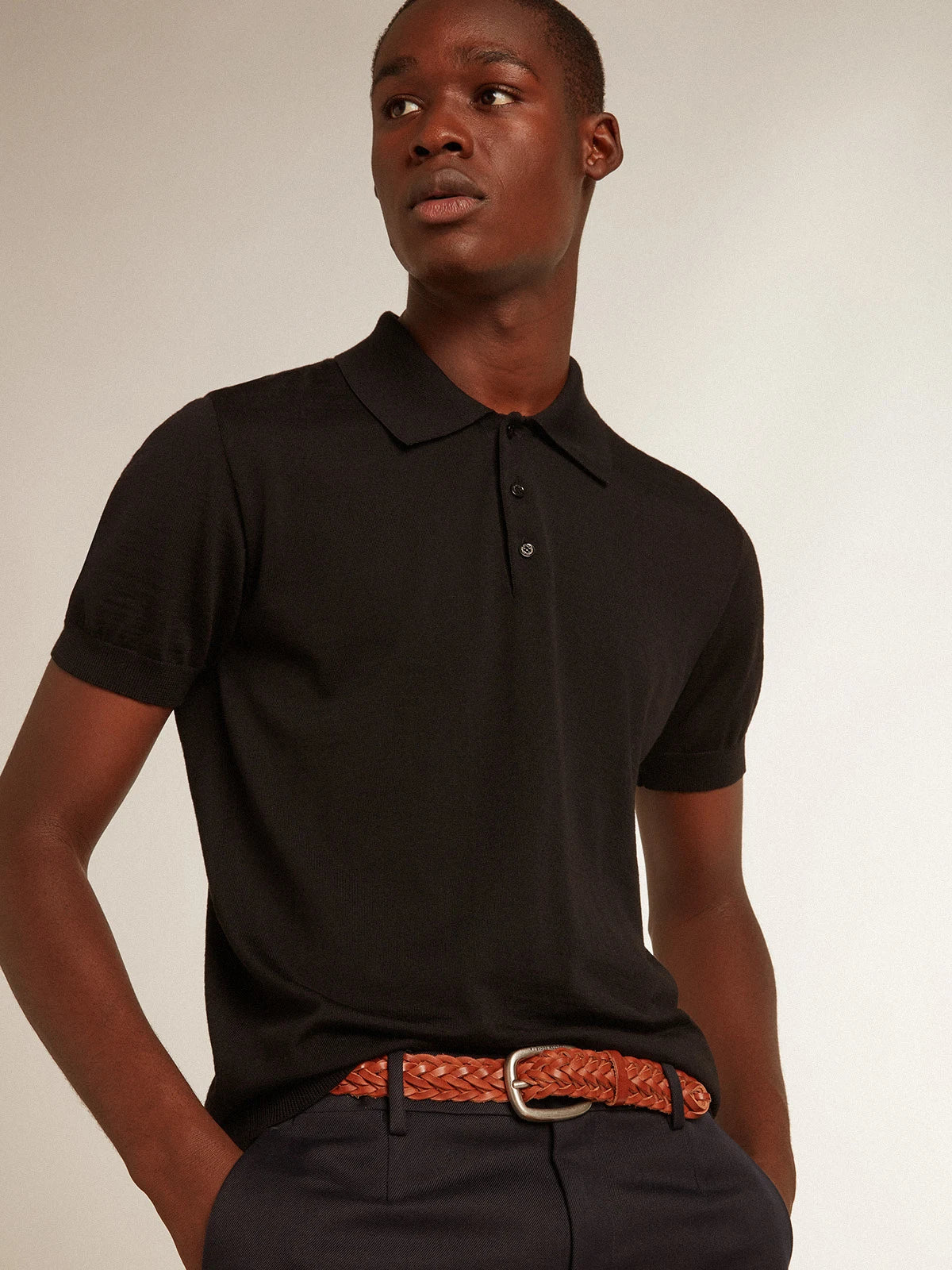 Polo maniche corte da uomo in lana merino di colore nero