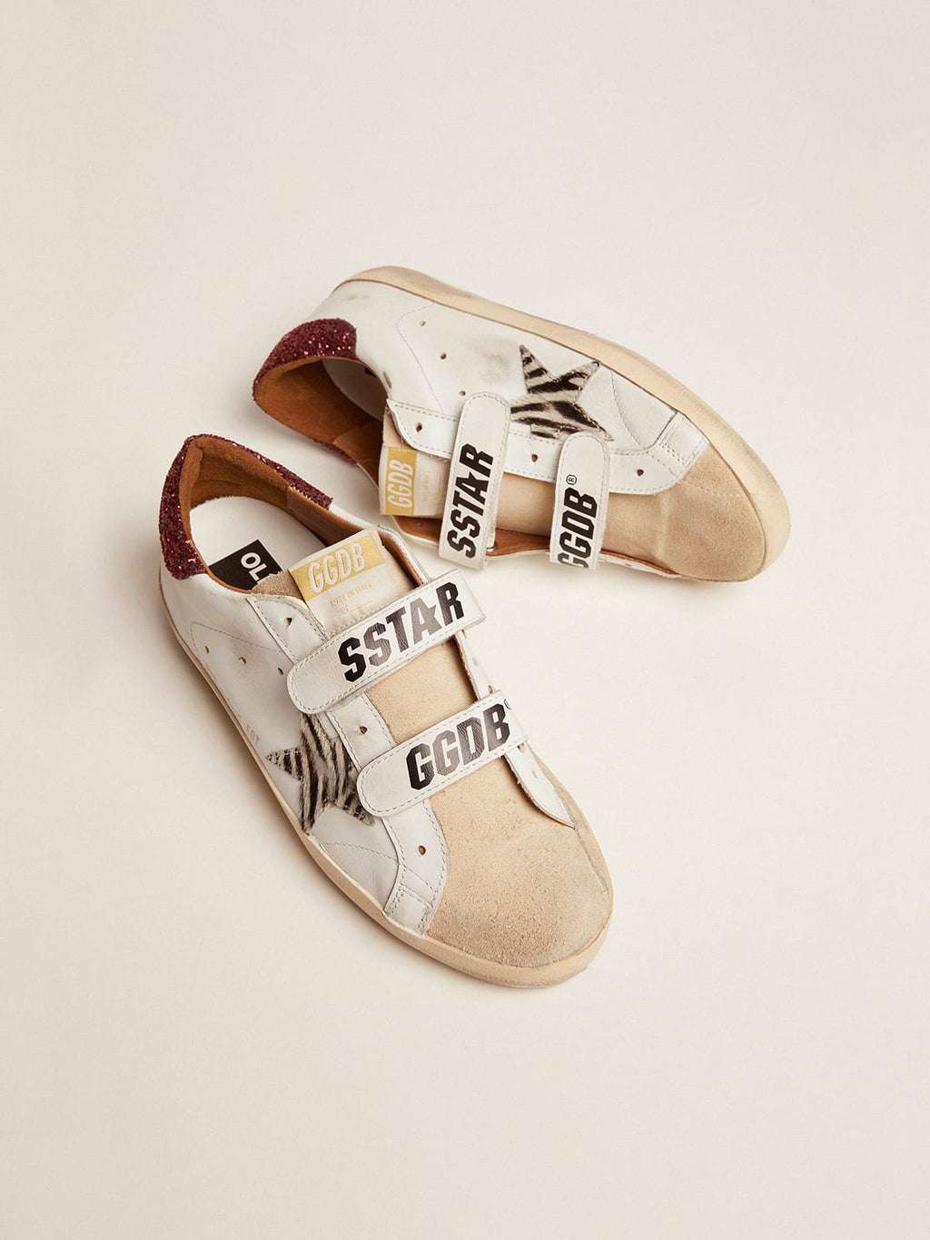 Sneaker Old School con stella in cavallino zebrato e talloncino in glitter rossi