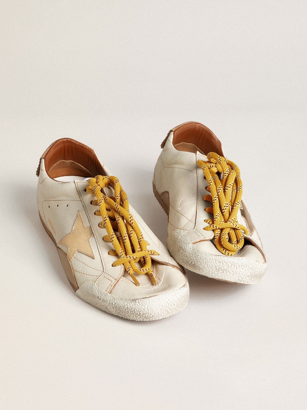 Men's True-Star in white nappa leather with gold foiled leather star and beige suede heel tab