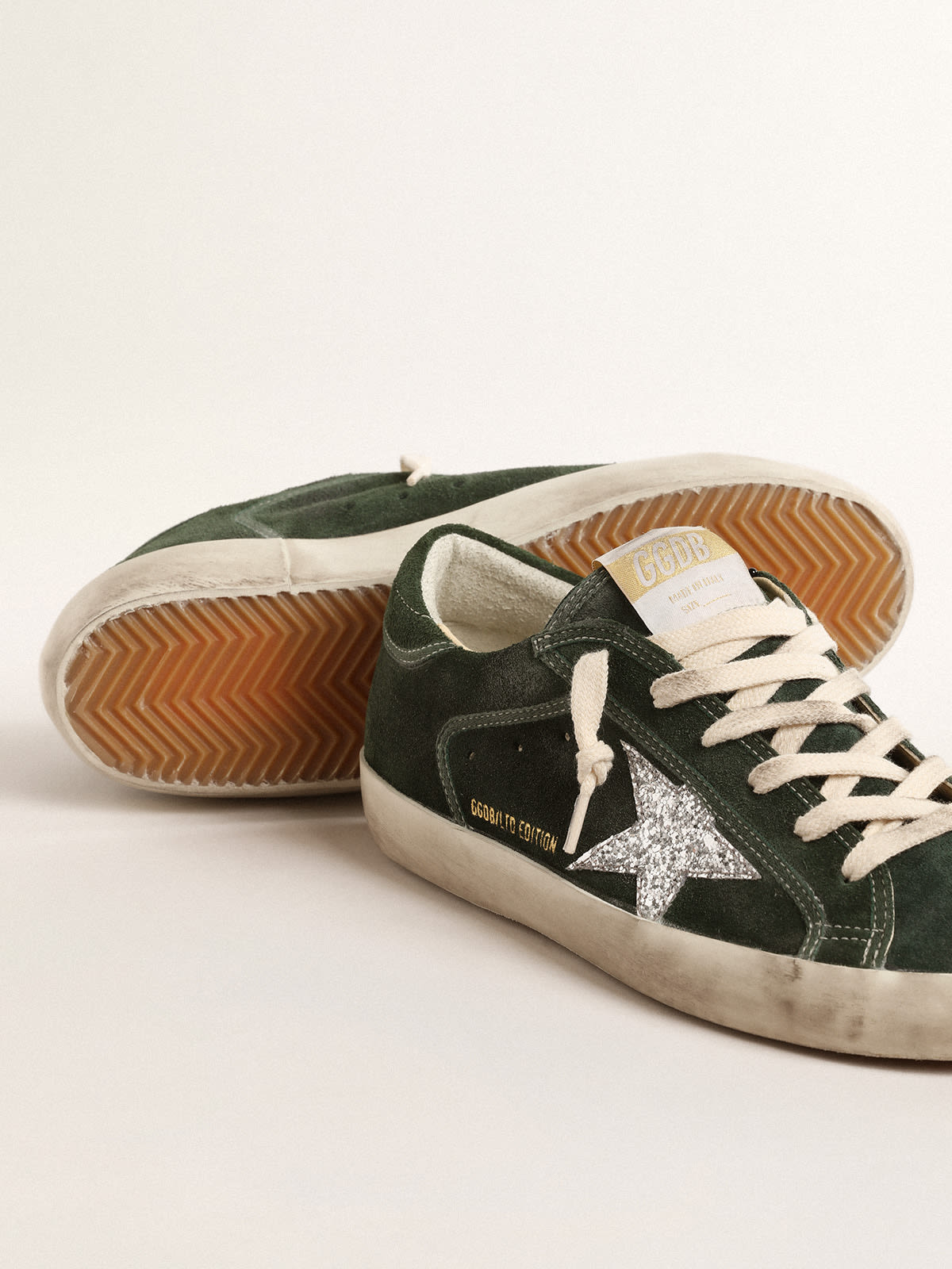 Super-Star LTD in suede verde con stella in glitter argento