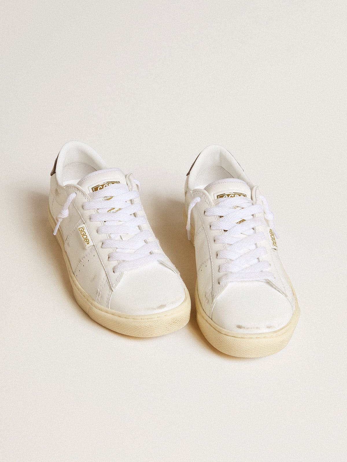 Women's Matchstar in white leather with dark blue leather heel tab