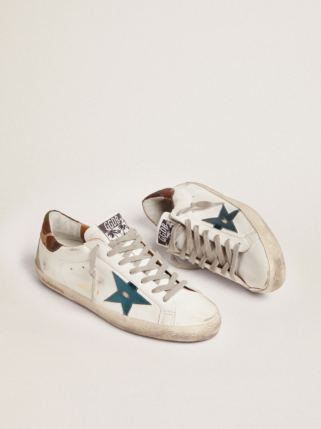 Sneaker Super-Star con stella in pelle laminata blu petrolio e talloncino in tessuto ripstop camou