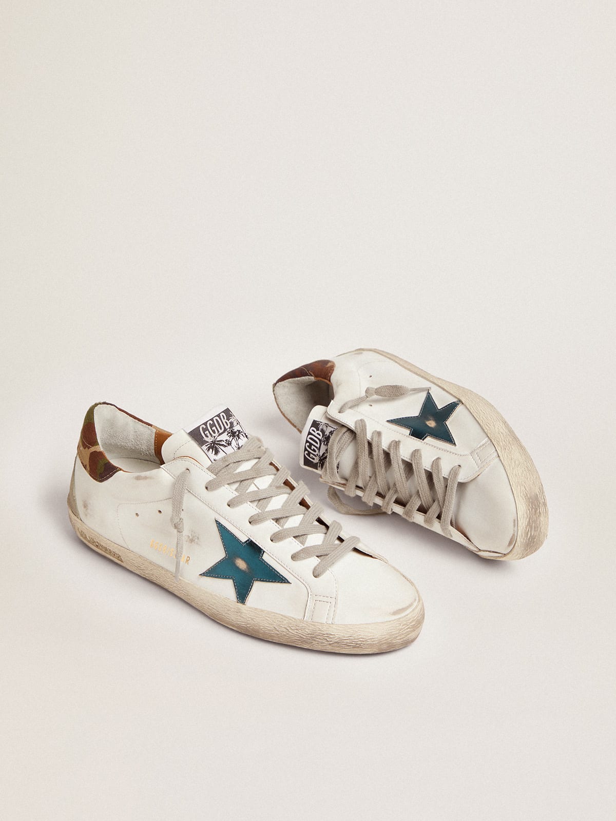 Sneaker Super-Star con stella in pelle laminata blu petrolio e talloncino in tessuto ripstop camou