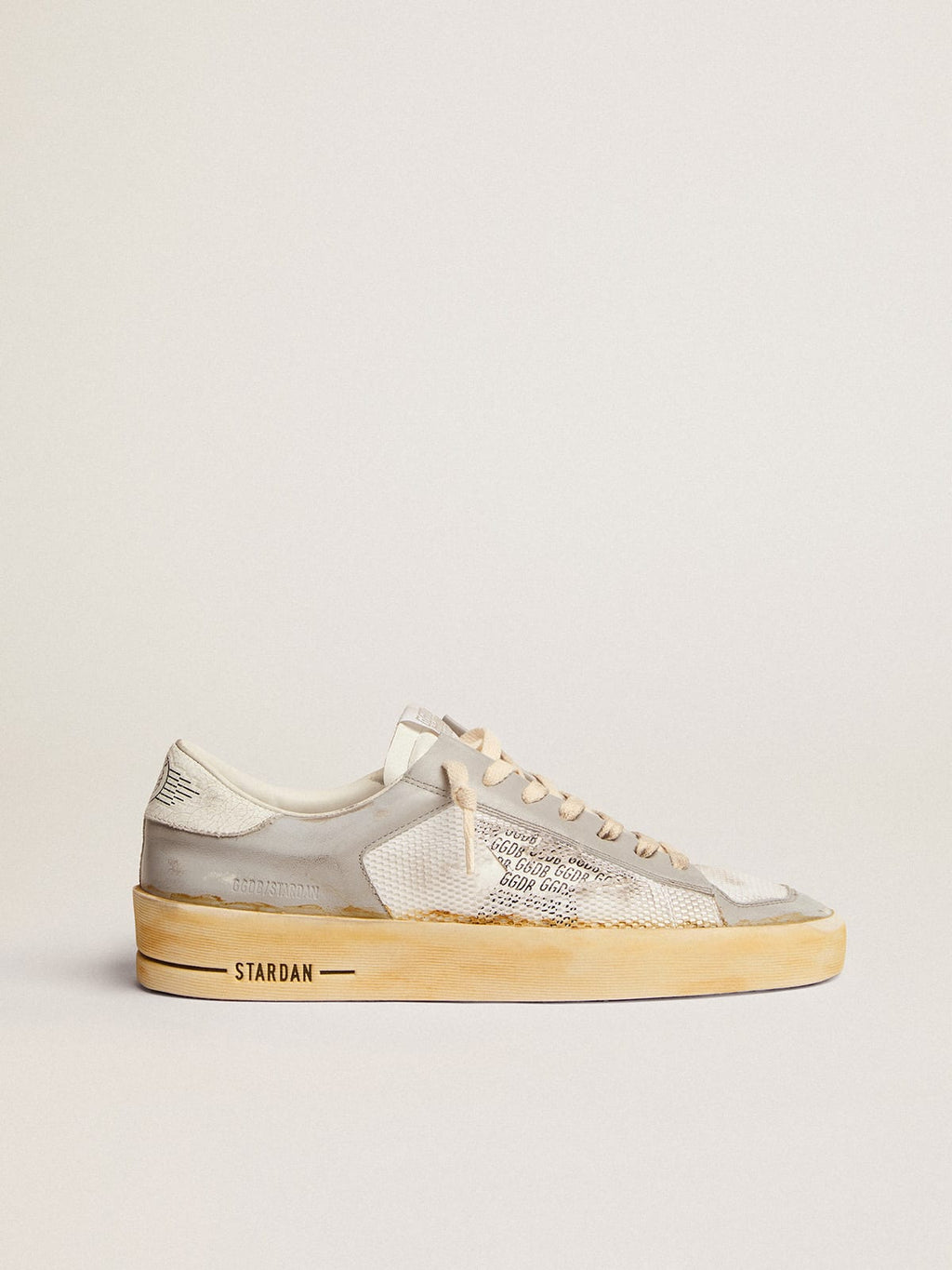 Sneaker Stardan con stella in pelle bianca con stampa GGDB e talloncino in pelle bianca cracklé