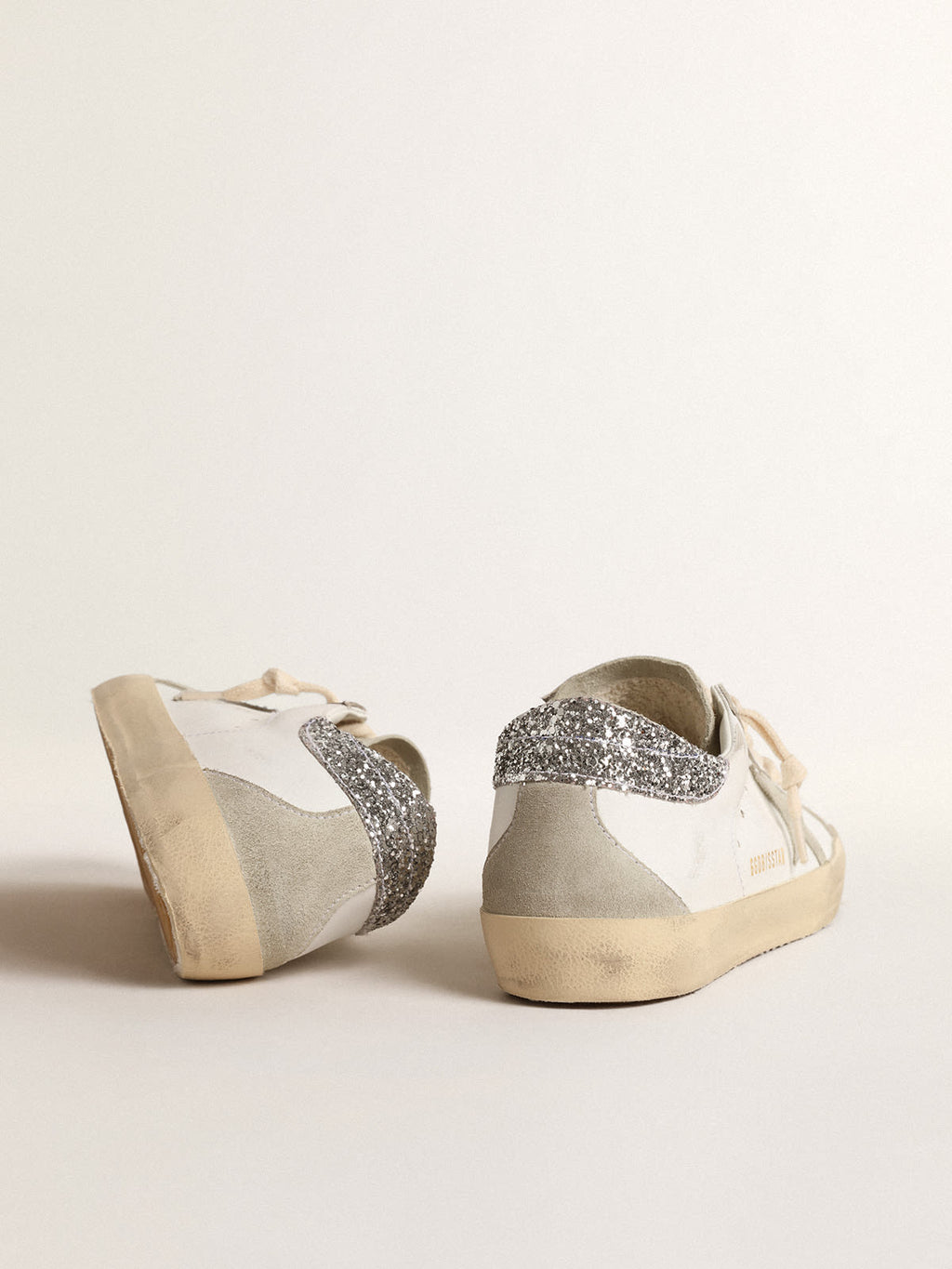 Super-Star con stella grigia e talloncino in glitter argento