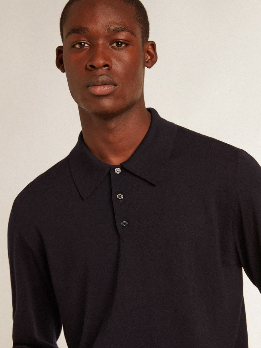 Polo maniche lunghe da uomo in lana merino di colore blu navy