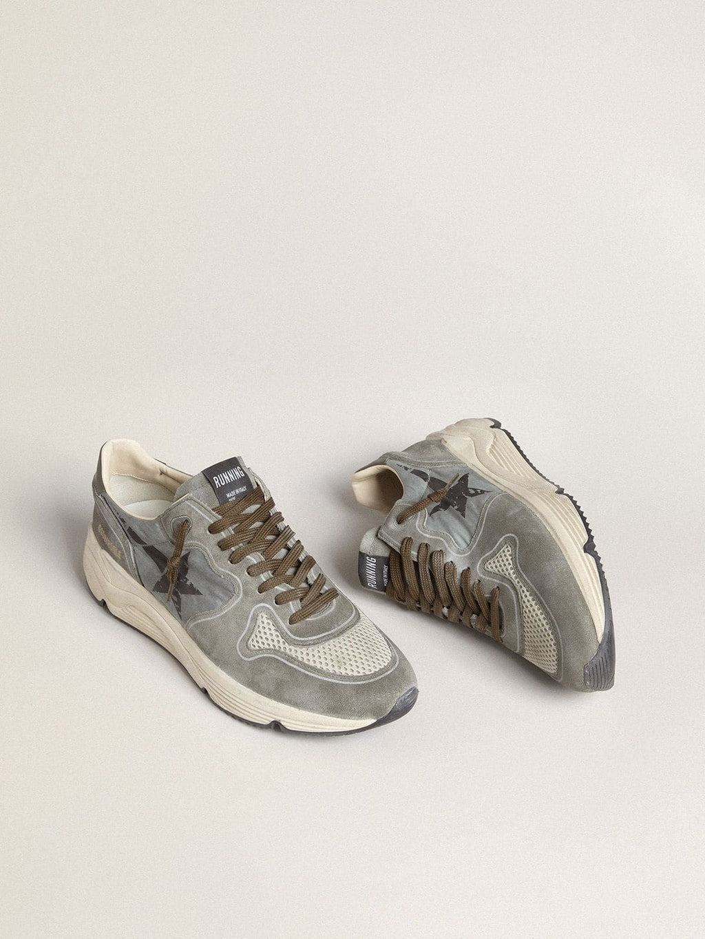 Men's Running Sole in light blue nylon with black star and green leather heel tab