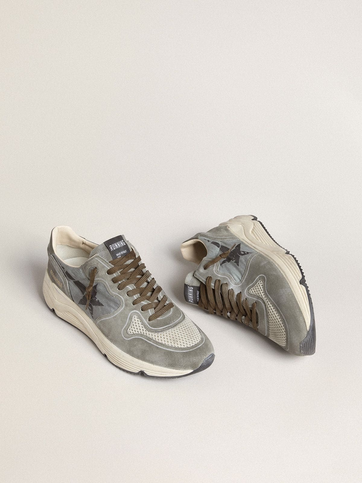 Men's Running Sole in light blue nylon with black star and green leather heel tab
