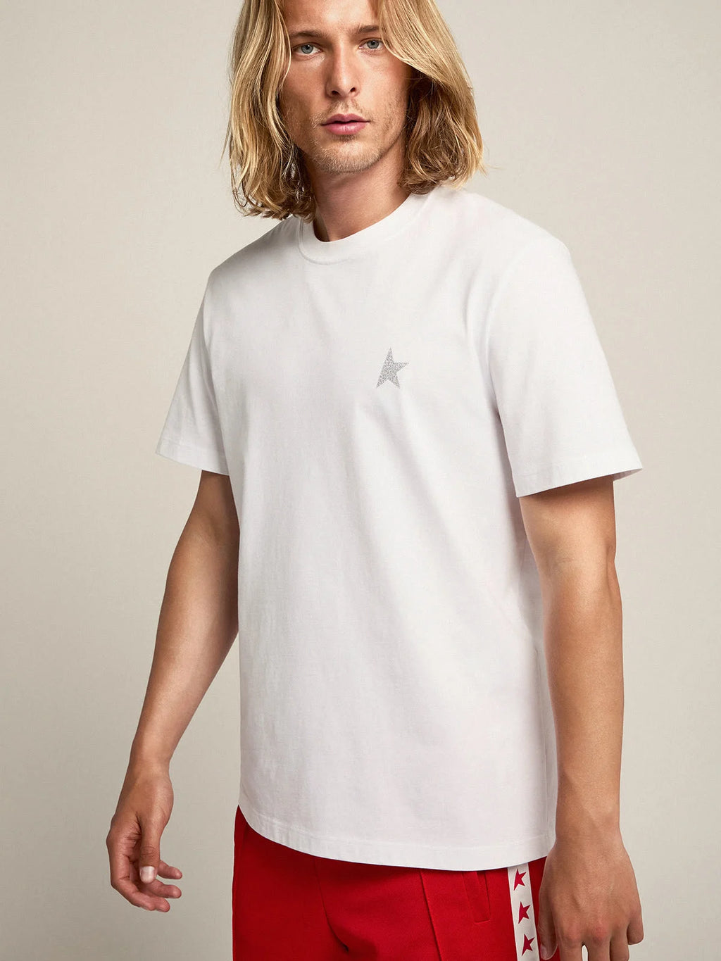 T-shirt bianca Collezione Star con stella in glitter argento sul davanti