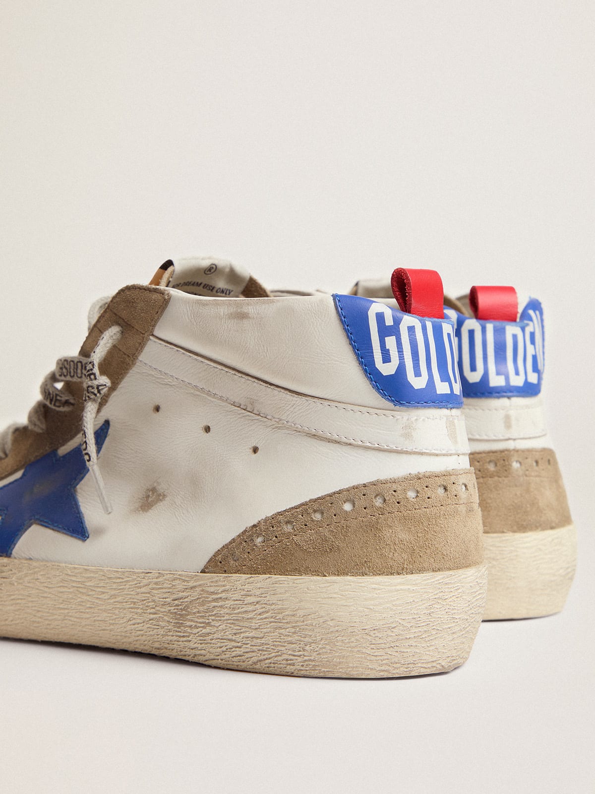 Mid Star in pelle bianca con stella blu e inserti color tortora