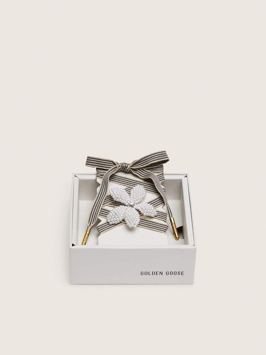 Skins "Vintage" black and beige striped laces with flower-shaped charm