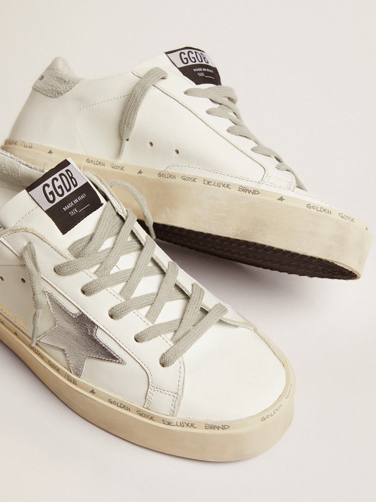 Sneakers Hi Star con stella e talloncino in argento metallizzato