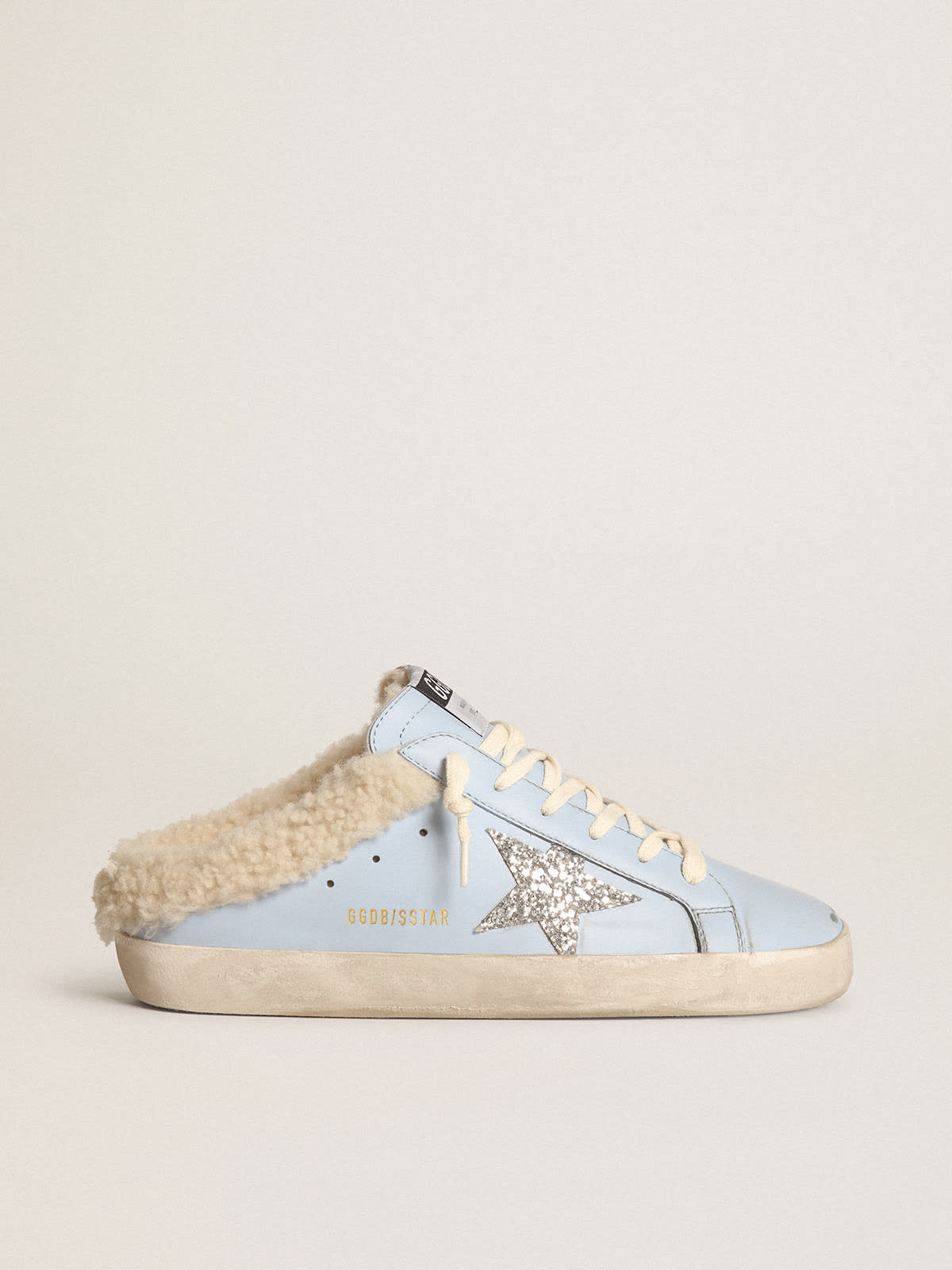 Super-Star Sabot in pelle azzurro polvere con stella in glitter argento e fodera in shearling beige