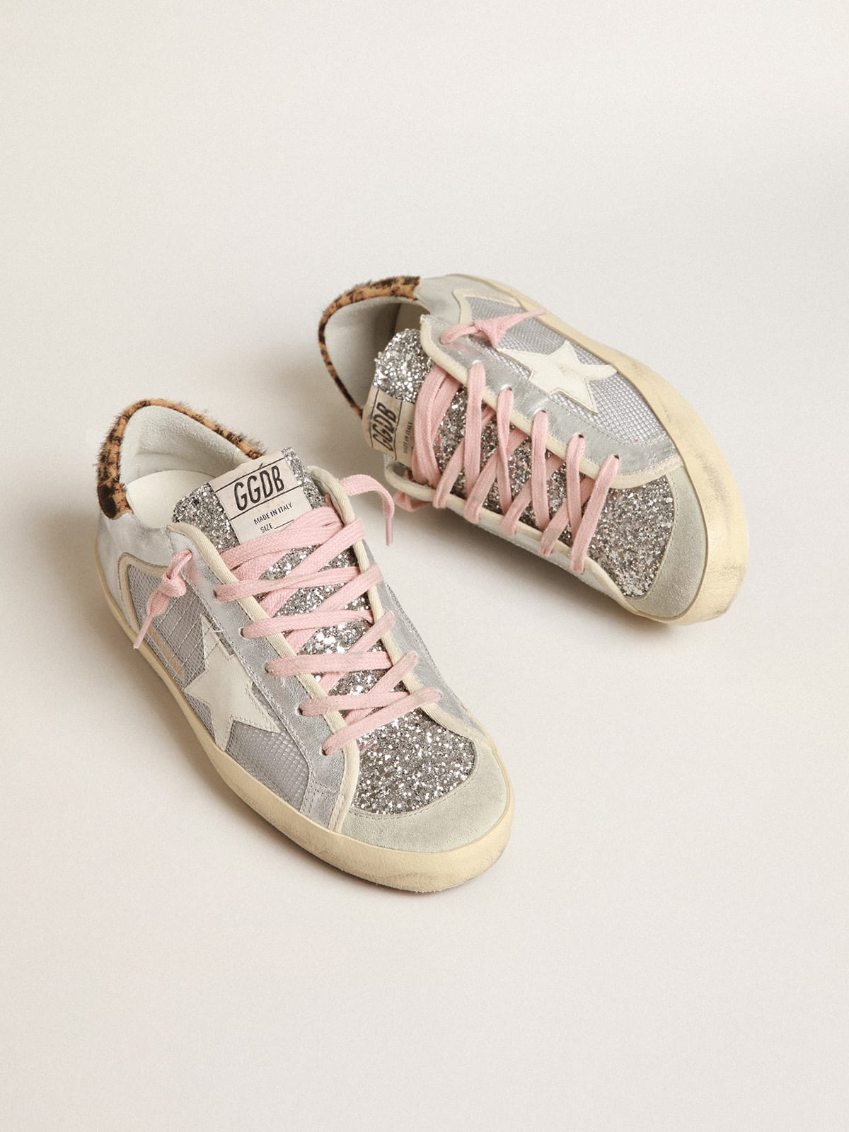 Super-Star LTD in rete e suede con linguetta in glitter argento