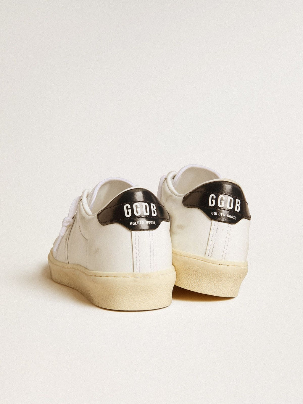 Women's Matchstar in white leather with dark blue leather heel tab