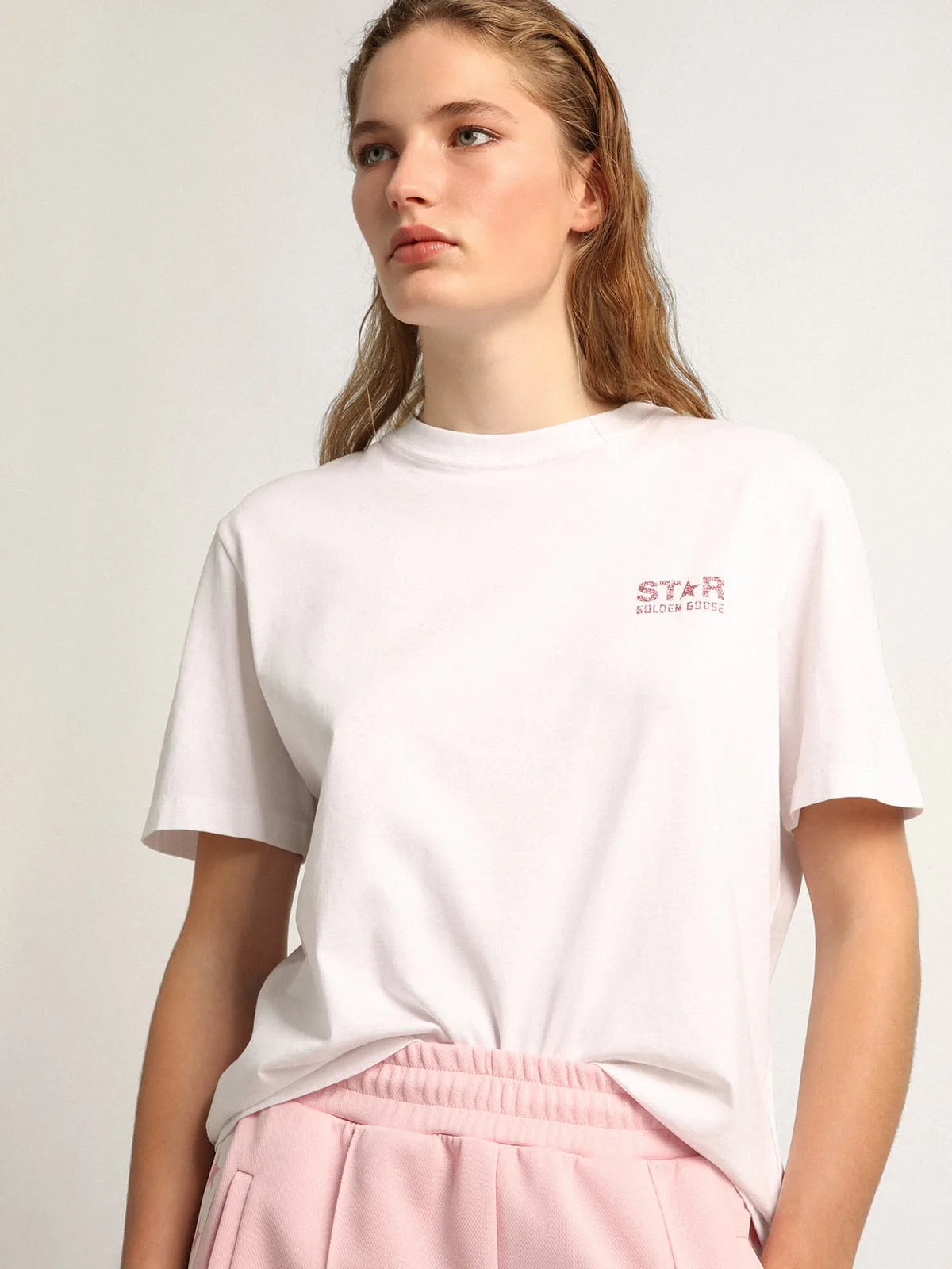 T-shirt bianca Collezione Star con logo e stella in glitter rosa