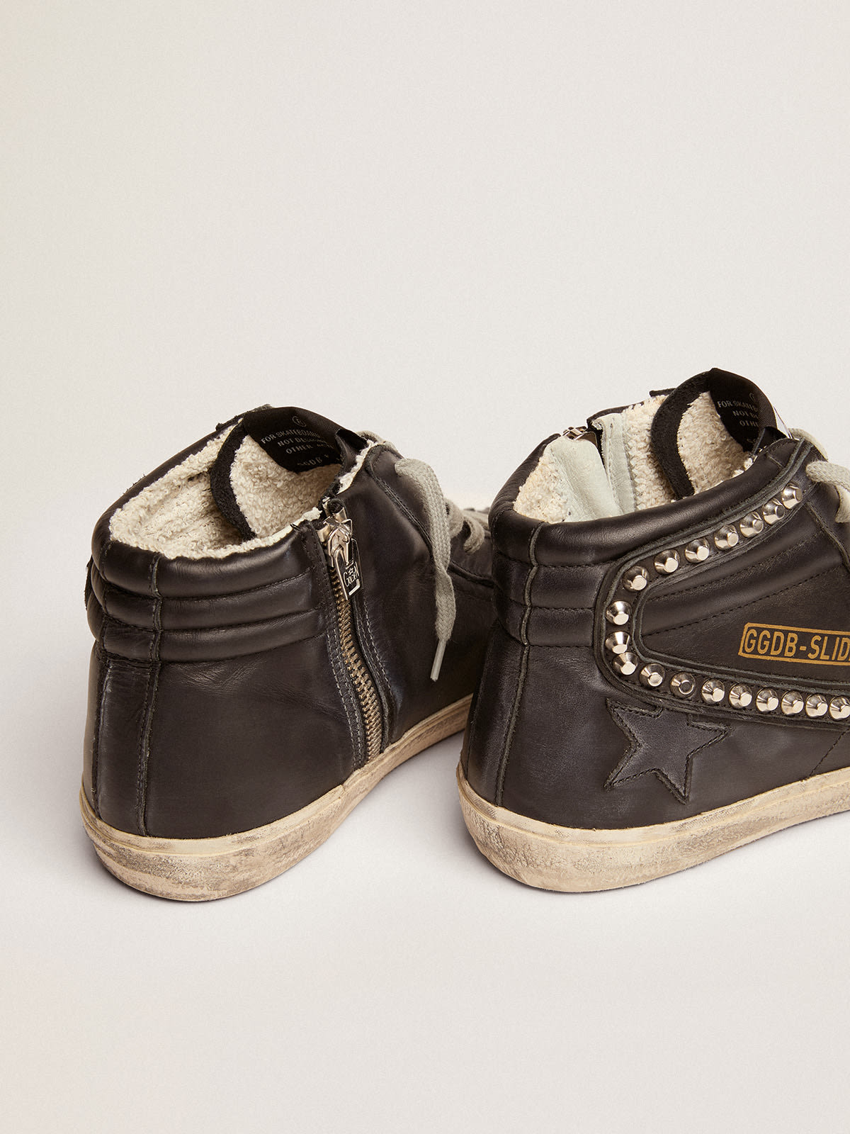 Sneakers Slide donna con borchie applicate